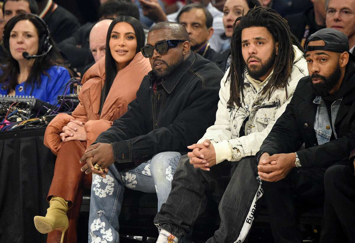 Celebrities sitting courtside at the NBA All-Star Game
